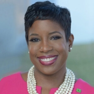 Headshot of Shelley Sylva, head of corporate citizenship at TD Bank, in a pink jacket.