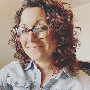 Headshot of Tina M. Barber in glasses and a light blue shirt. Headshot of Tina M. Barber in glasses and a light blue shirt.