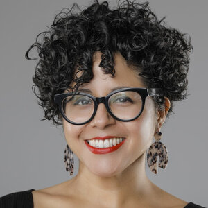 Headshot of Favianna Rodriguez is co-founder and president of The Center for Cultural Power, in glasses and a black top. (Photo credit: Scott LaRockwell) Headshot of Favianna Rodriguez is co-founder and president of The Center for Cultural Power, in glasses and a black top. (Photo credit: Scott LaRockwell)