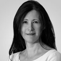 Black and white headshot of Sharon Love Runyon, CEO of STRUT and STRUT CARES. Black and white headshot of Sharon Love Runyon, CEO of STRUT and STRUT CARES.