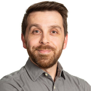 Headshot of Evan Wildstein, a nonprofiteer in Houston, Texas, director of community philanthropy at Every Texan.