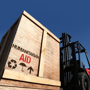 A large wood crate containing humanitarian aid.