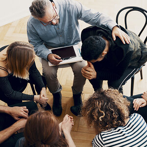 A group meeting for people struggling with substance use disorder. A group meeting for people struggling with substance use disorder.