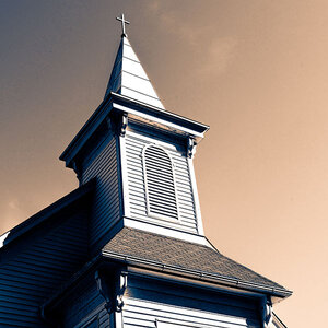 The steeple of a church.