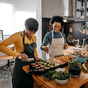 Women cooking together.