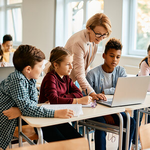 Children working on a computer. Children working on a computer.