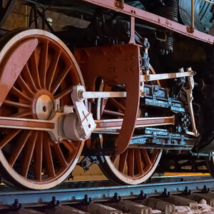 Wheels of an old steam locomotive.