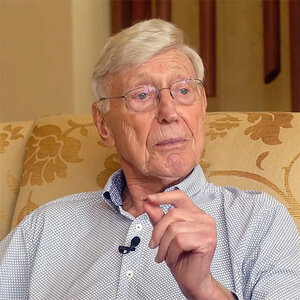 An older man gestures with his hand as he sits in a chair talking—a photo of Bernie Marcus. An older man gestures with his hand as he sits in a chair talking—a photo of Bernie Marcus.