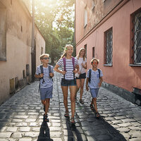 Teens walking in a street. Teens walking in a street.