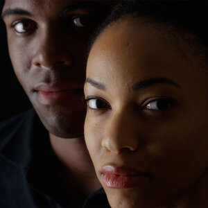 Black couple face forward. Black couple face forward.