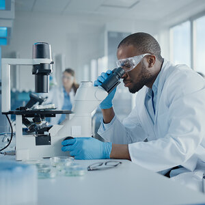 Two researchers working in a lab.