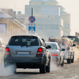 Cars emitting pollution into the air.