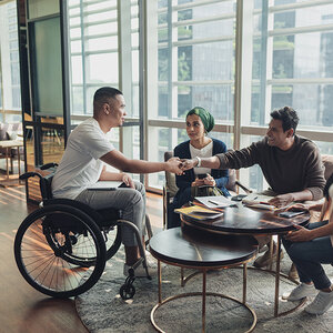 A disability activist working with a group.