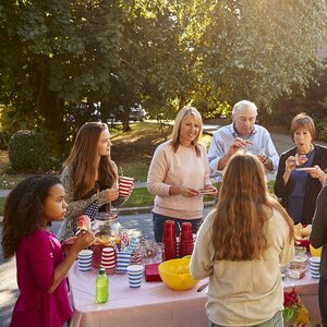 A group eats a healthy meal together A group eats a healthy meal together