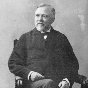 A black and white photo of a bearded man of Scottish descent: Andrew Carnegie.