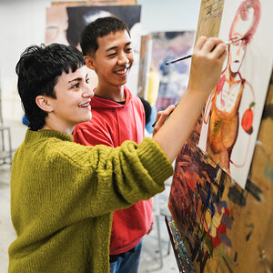 Art students collaborate on a project. Art students collaborate on a project.