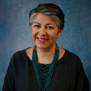 Headshot of Andrea Sáenz.