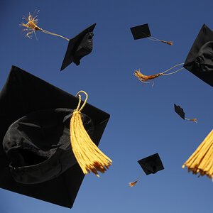 Graduation caps during a college ceremony.