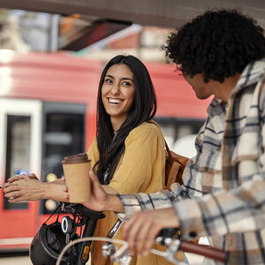 People smiling in a city. People smiling in a city.