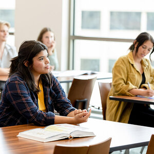Students in a high school classroom. Students in a high school classroom.