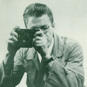 William Clements with a camera in his college years.