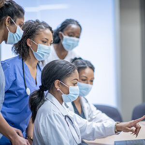 Doctors and nurses working together.