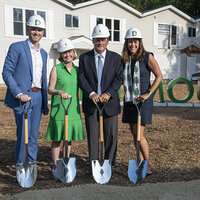 Donors holding shovels at a groundbreaking. Donors holding shovels at a groundbreaking.