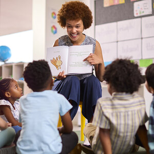 Children learning to read in class.