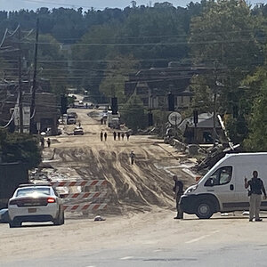 Muddied streets in Asheville, North Carolina following Hurricane Helene. Muddied streets in Asheville, North Carolina following Hurricane Helene.
