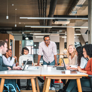 A group of staff members joining for a meeting.