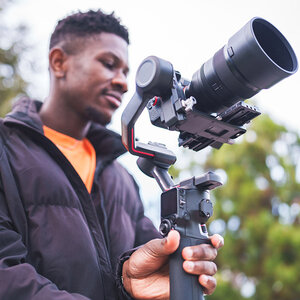 A filmmaker shooting a scene.