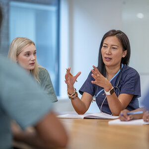 A public health leader in a meeting.