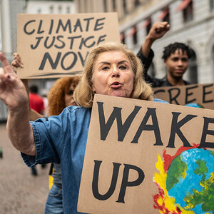 A women protesting for climate justice.