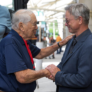 Actor Gary Sinise (right) shaking hands with a veteran. Actor Gary Sinise (right) shaking hands with a veteran.