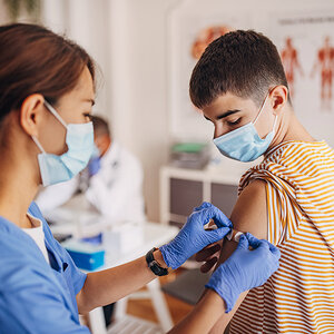 A child receiving a vaccine.