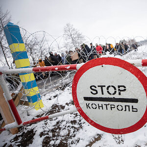 Refugees waiting in line during the war in Ukraine.