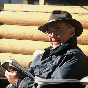 An image of Gordon Moore, holding a book, while on a foundation trip to Kamchatka