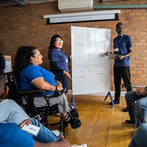 A philanthropic group hosting a meeting with members.