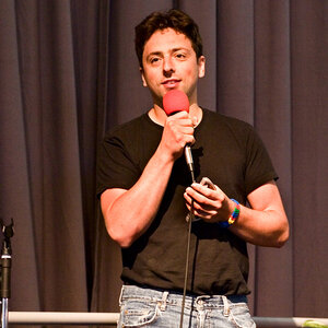 Sergey Brin speaking on stage.