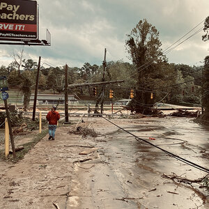 Downed trees and powerlines in Asheville, North Carolina. Downed trees and powerlines in Asheville, North Carolina.