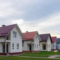 A row of newly built two-story homes.