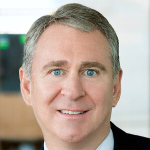 A man with greying hair wearing business suit - a photo of Kenneth C. Griffin.
