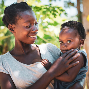 An African mother holding her baby.