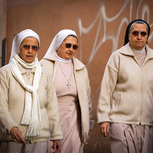Three elderly nuns walking in the streets of Rome. Three elderly nuns walking in the streets of Rome.