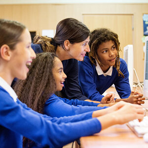 Girls in a computer class together. Girls in a computer class together.