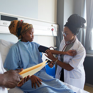 A woman receiving health care.