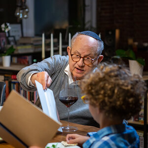 A Jewish family sitting for Seder.