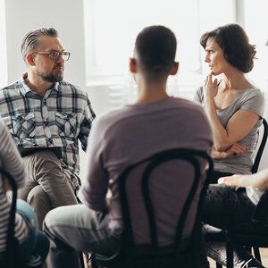 A research group sitting together.