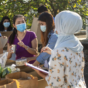 Volunteers working a donation drive.