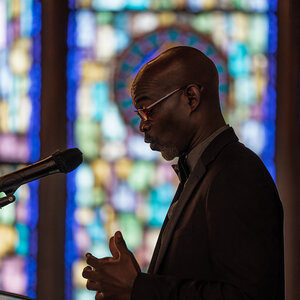 A pastor addressing his congregation.